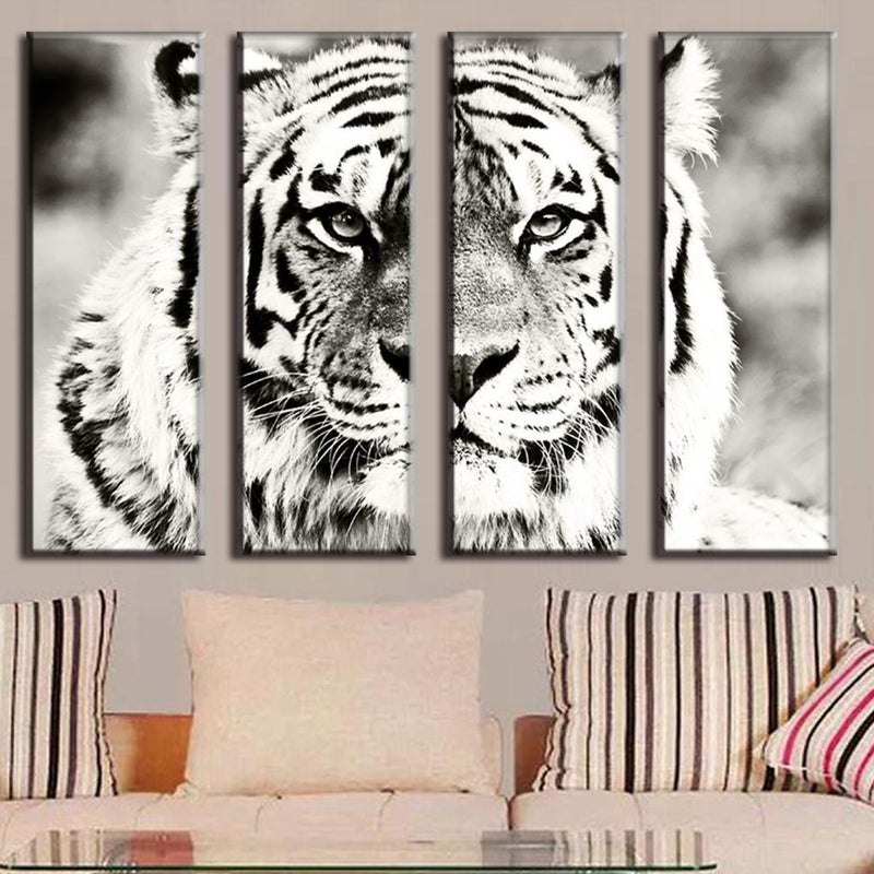 Black and White Tiger - Dramatic 4-panel canvas wall art featuring a close-up monochrome portrait of a majestic tiger with intense eyes, split across multiple pieces for striking modern home decor display