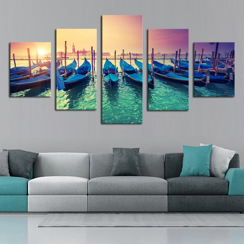 Boats in the Sunset - 5 Piece canvas art showing blue gondolas moored at sunset in Venice, with turquoise water reflections and warm orange sky, perfect for living room wall decor