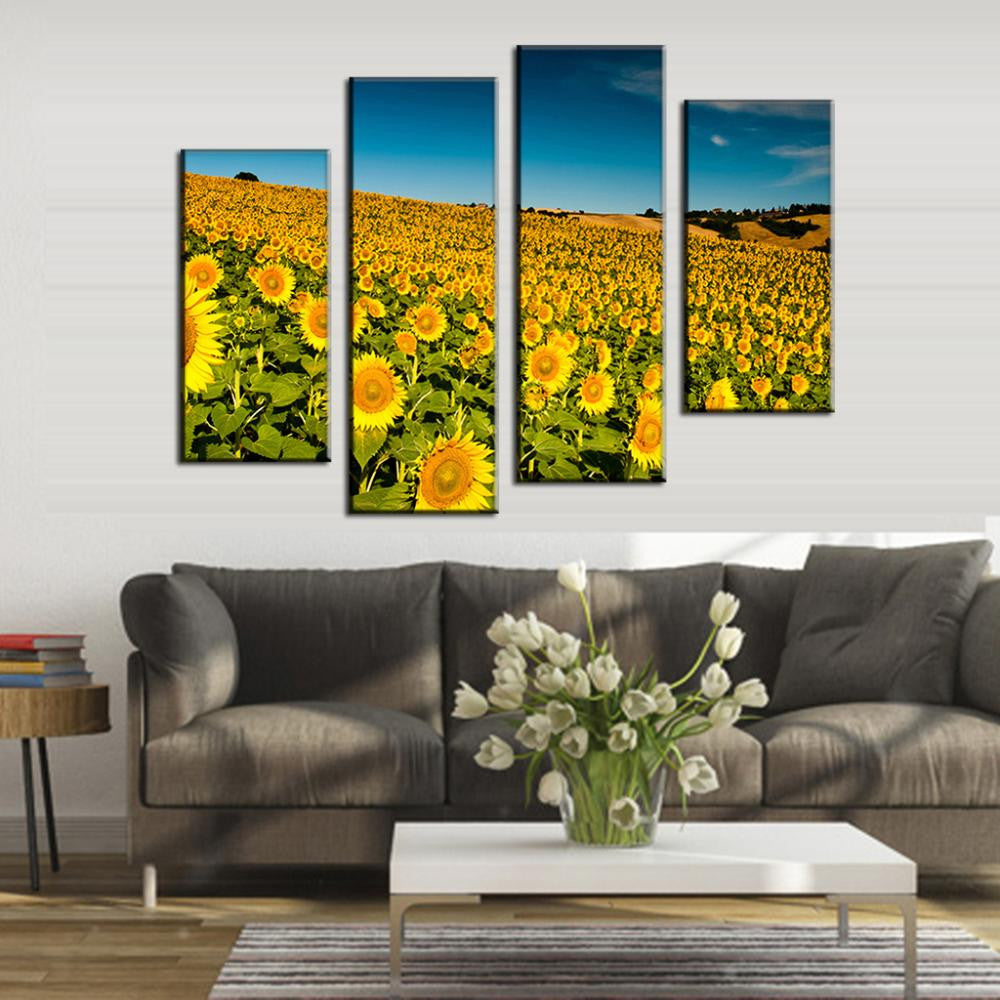 Field of Sunflowers canvas wall art displaying vibrant yellow sunflower fields against deep blue sky, split into 4 panels perfect for home decor, showcasing rolling hills and endless blooming sunflowers in stunning landscape photography